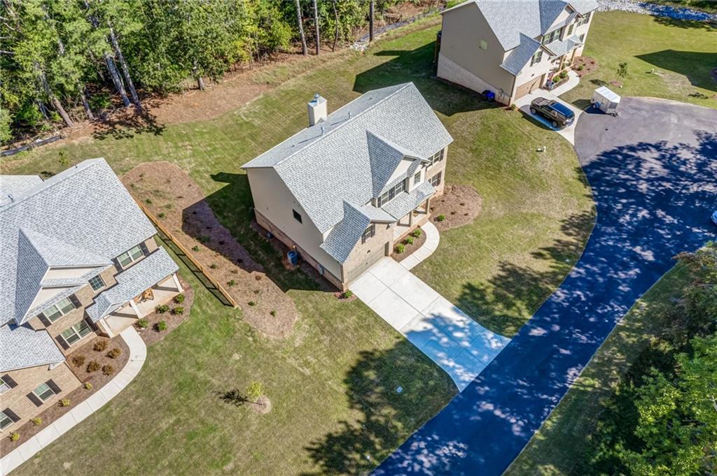 3430 South Scales Road Duluth, GA 30097 - Photo 71 of 77 an aerial view of a house with a yard
