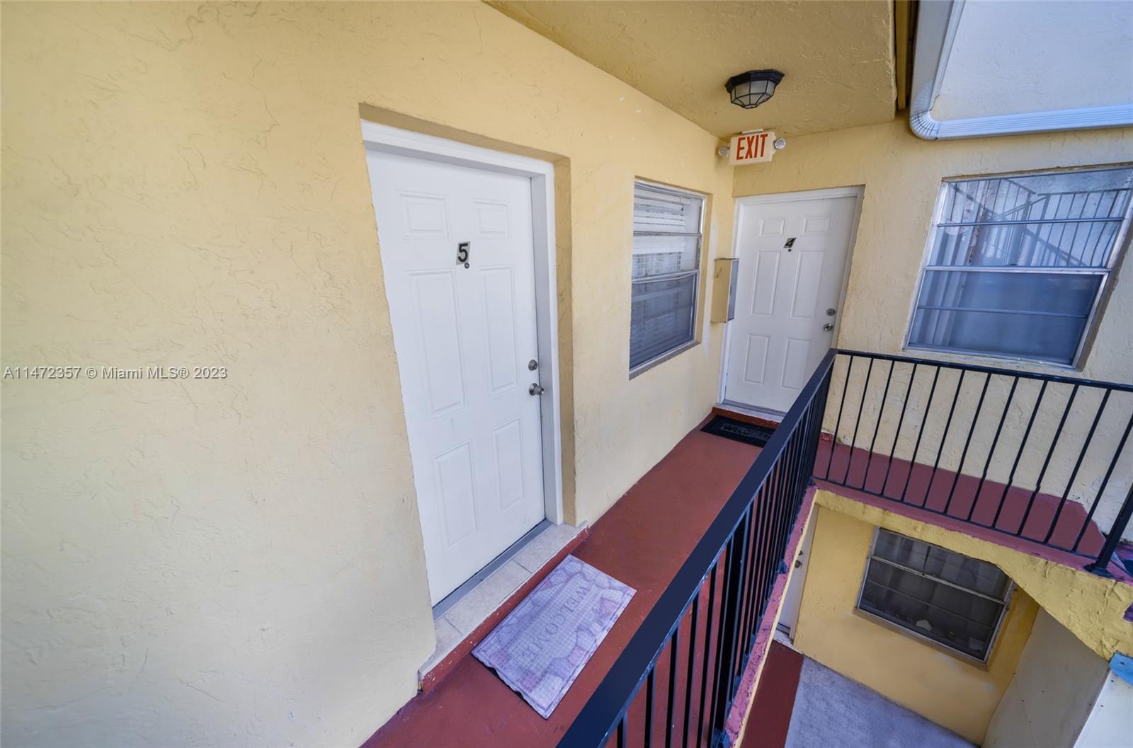 1137 Northwest 2nd Street Miami, FL 33128 - Photo 32 of 32 a view of an entryway with a workspace