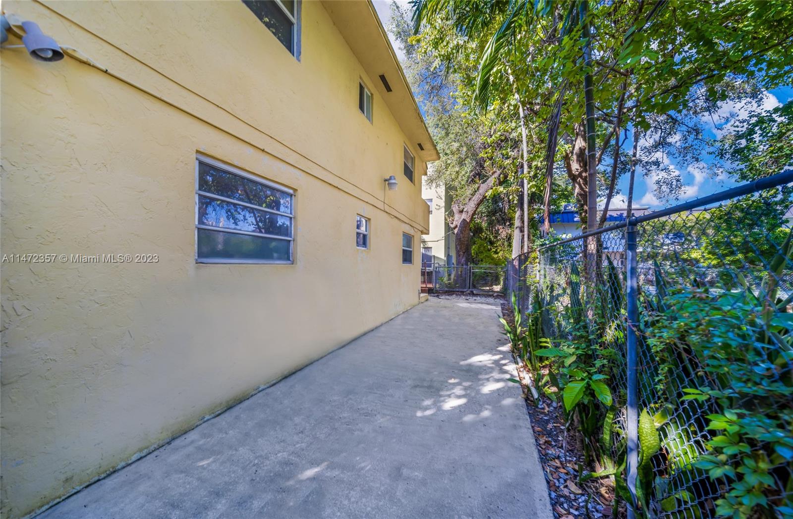 1137 Northwest 2nd Street Miami, FL 33128 - Photo 6 of 32 a view of a house with a street
