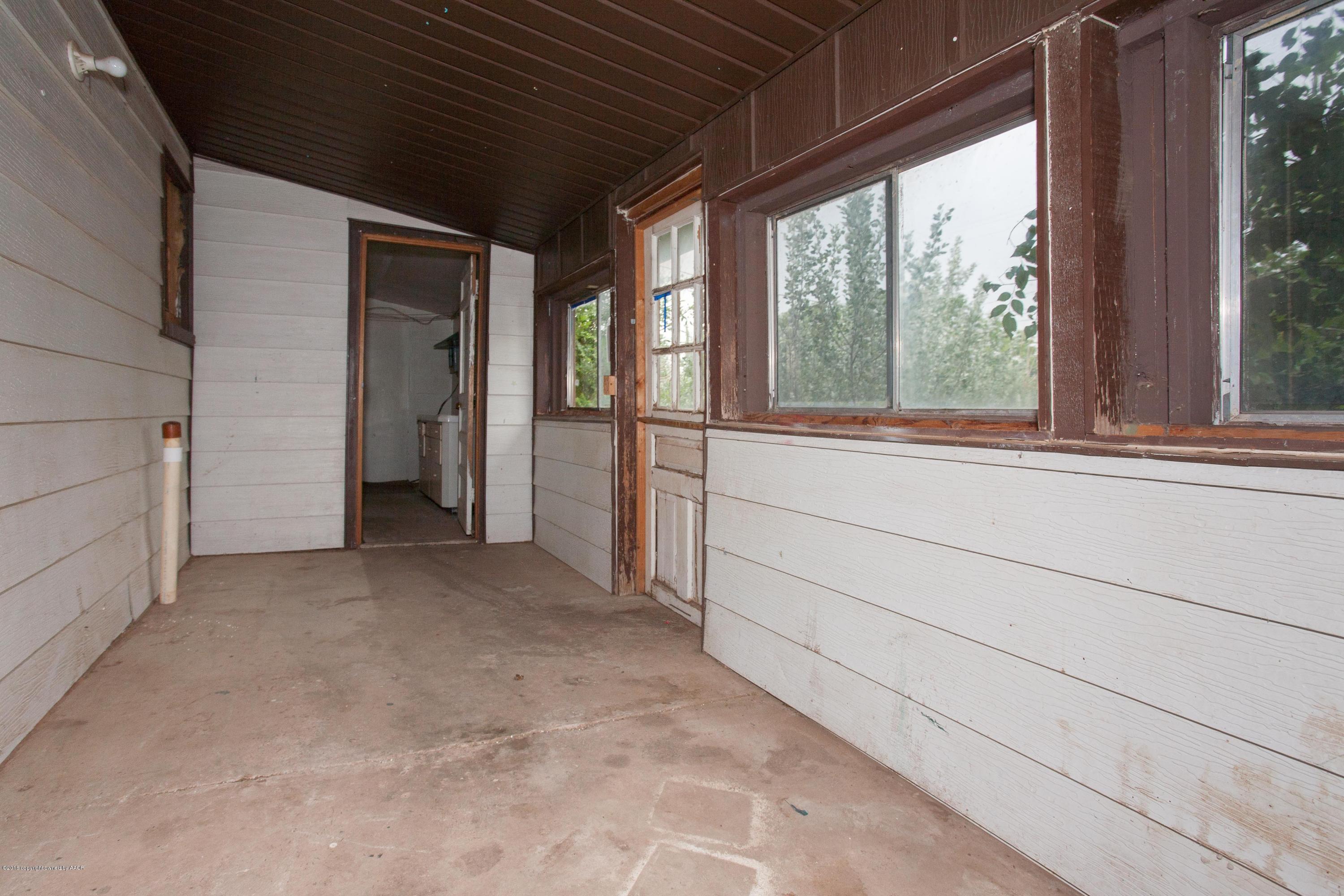 106 3rd Vega, TX 79092 - Photo 26 of 37 026_Sunroom