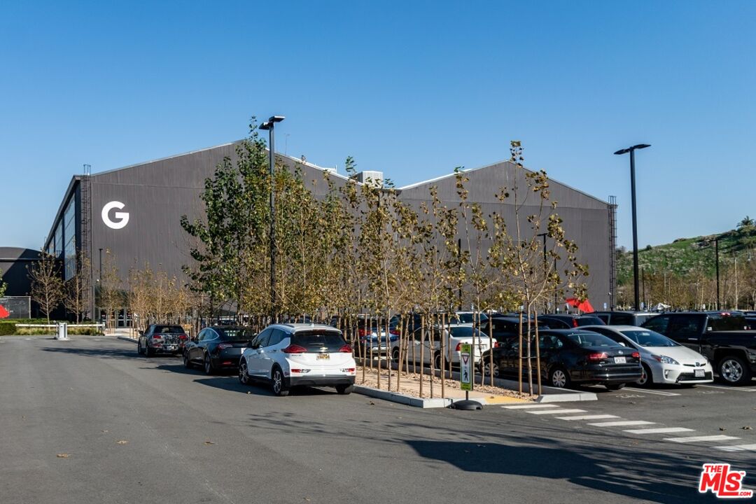 12963 West Runway Road, Unit 408 Playa Vista, CA 90094 - Photo 44 of 44 a car parked in front of a building
