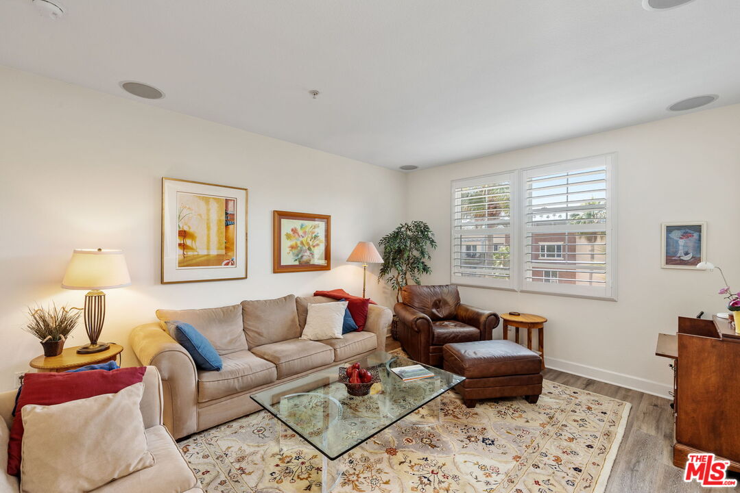 12963 West Runway Road, Unit 408 Playa Vista, CA 90094 - Photo 6 of 44 a living room with furniture and a window