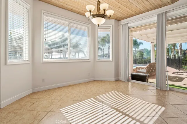 a view of a storage and utility room with washer and dryer