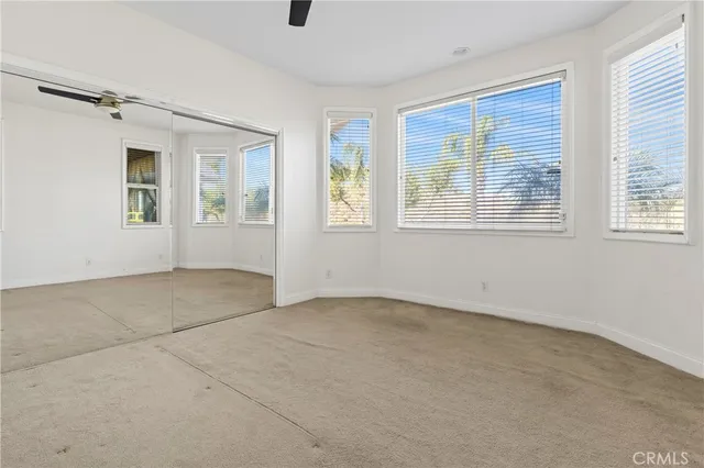 a view of a room with a large window