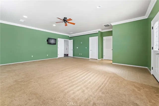 a bathroom with a granite countertop sink toilet a mirror and shower