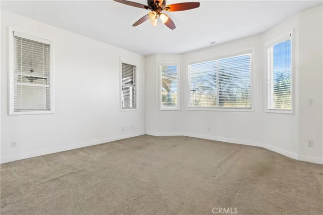 a bathroom with double vanity sinks and a mirror
