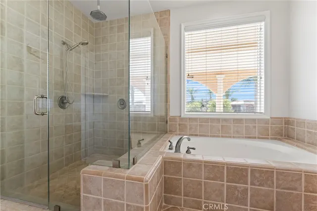 a swimming pool with lots of palm trees