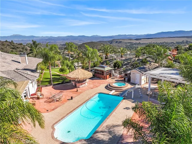 a view of a city with lawn chairs