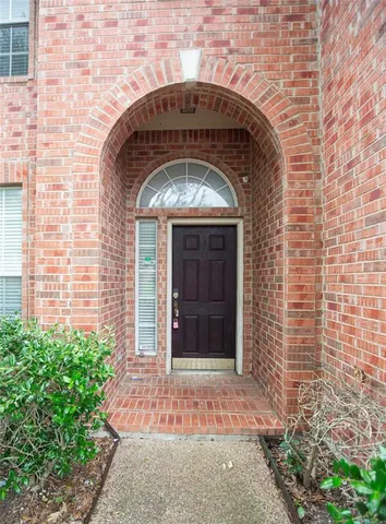 a front view of a stone house