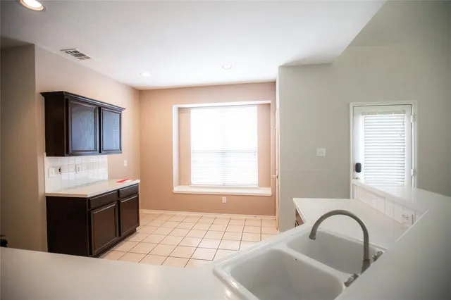 a living room with furniture and window