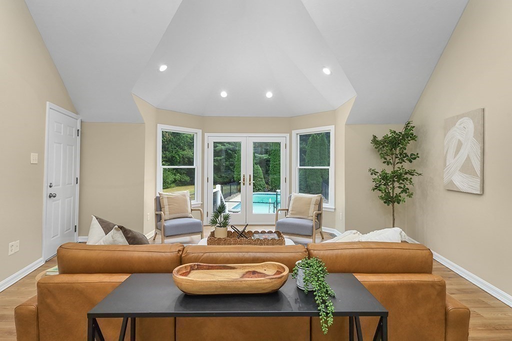 94 Hudson Road Stow, MA 01775 - Photo 14 of 30 a living room with furniture and a large window