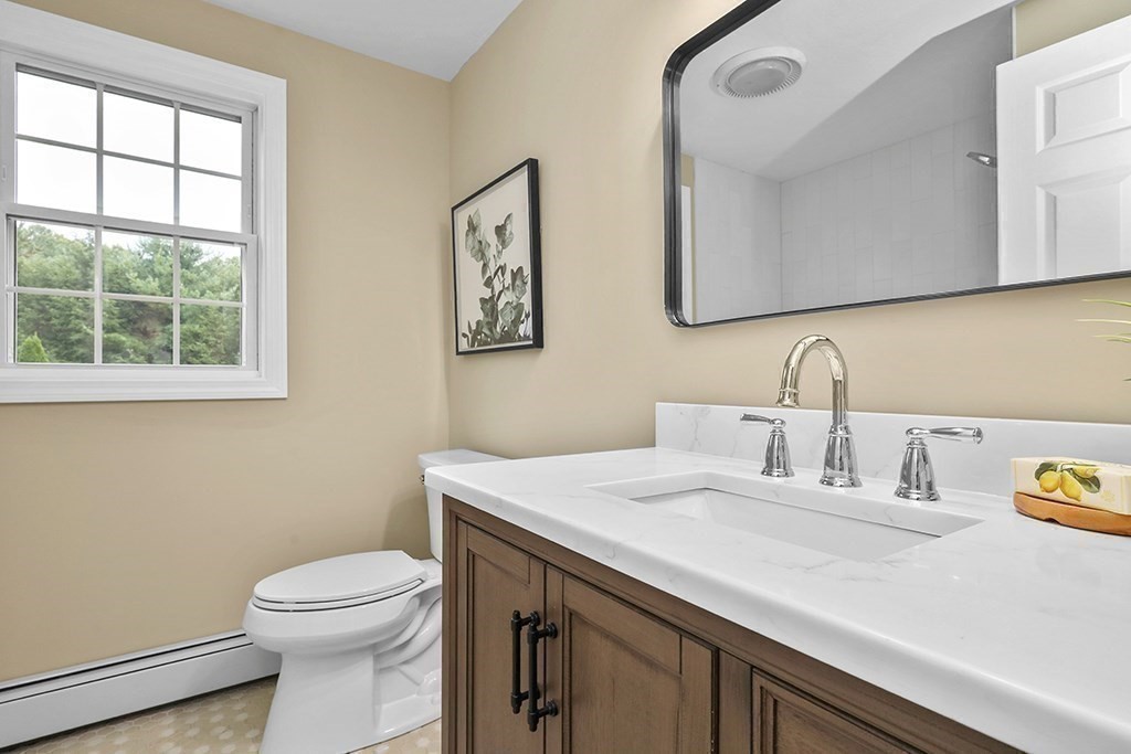 94 Hudson Road Stow, MA 01775 - Photo 23 of 30 a bathroom with a sink and a toilet