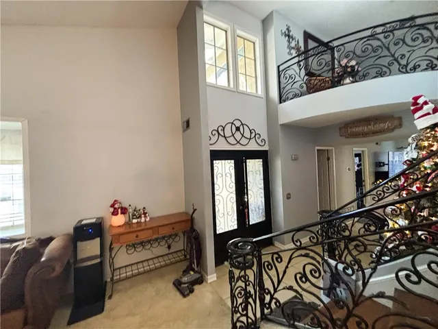 a bedroom with furniture and a window