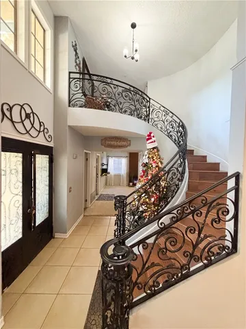 a living room with furniture a couch and a fireplace