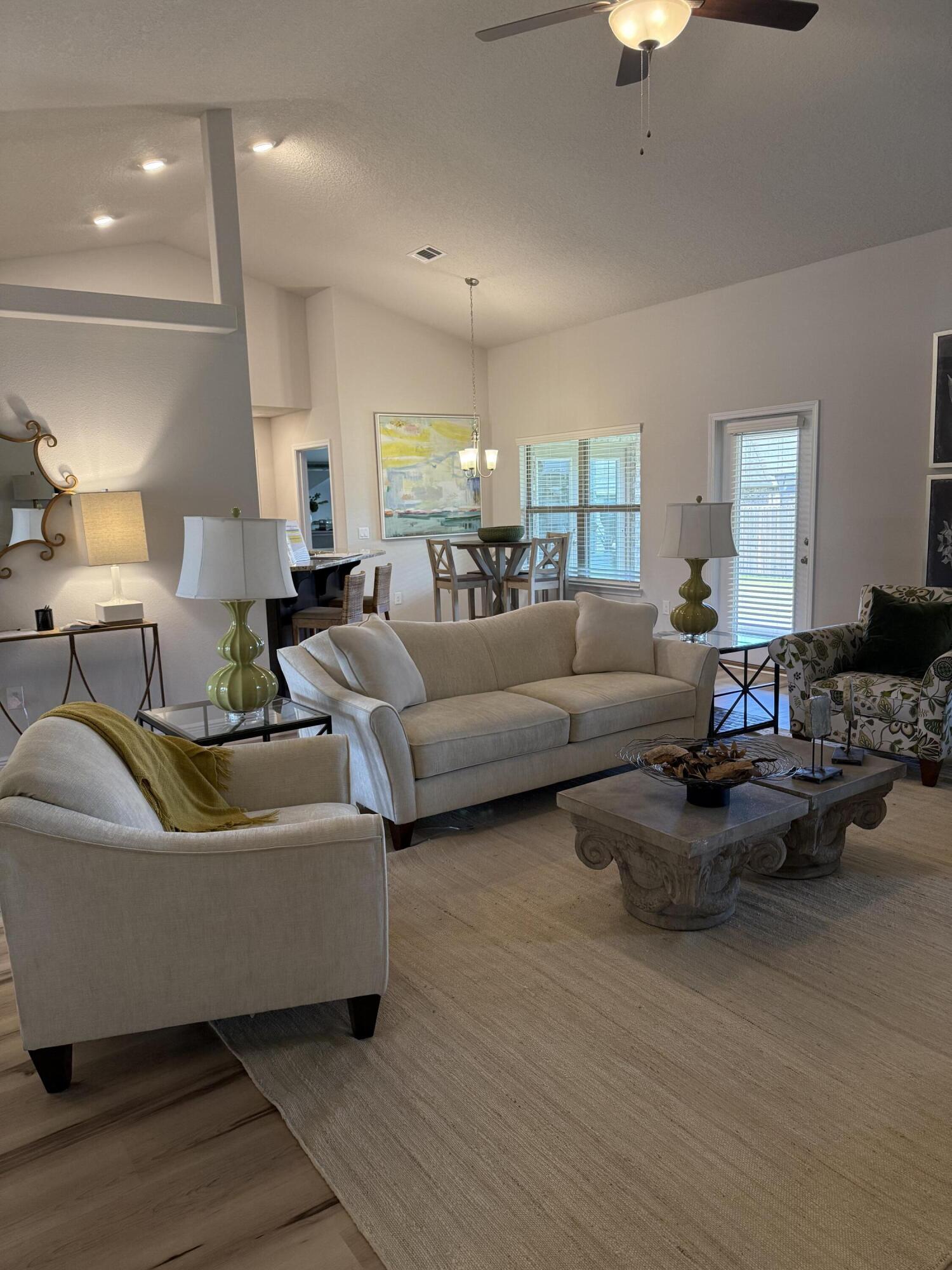5825 Crestlake Drive Crestview, FL 32536 - Photo 13 of 29 a living room with furniture and a large window