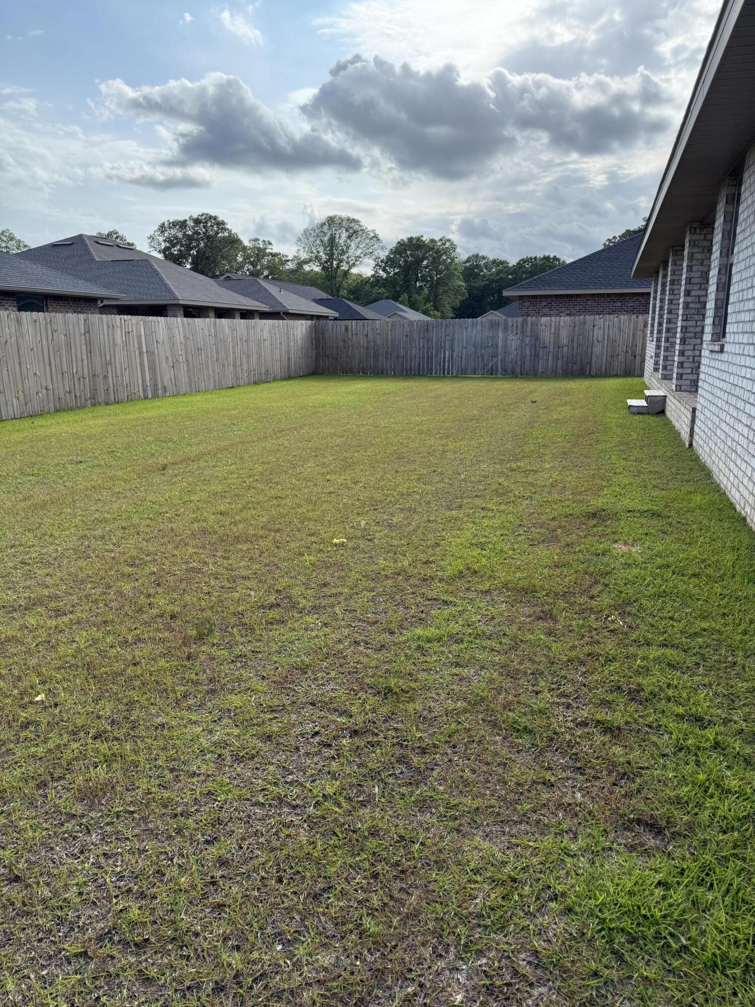 5825 Crestlake Drive Crestview, FL 32536 - Photo 29 of 29 a view of a swimming pool and mountains