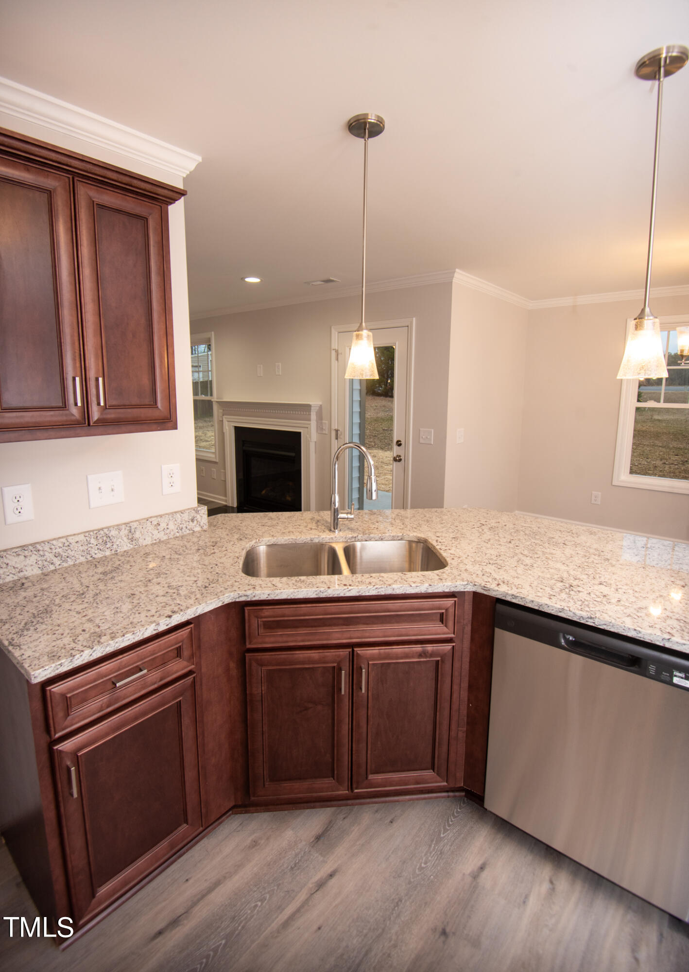 243 Waters Edge Drive Erwin, NC 28339 - Photo 13 of 53 a kitchen with a sink and cabinets