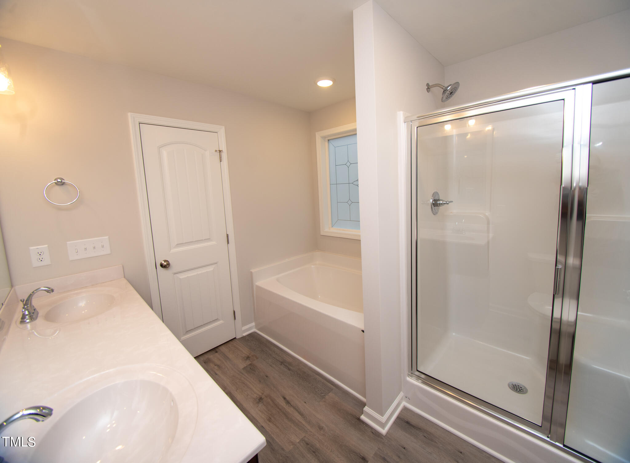 243 Waters Edge Drive Erwin, NC 28339 - Photo 20 of 53 a bathroom with a bathtub and a shower