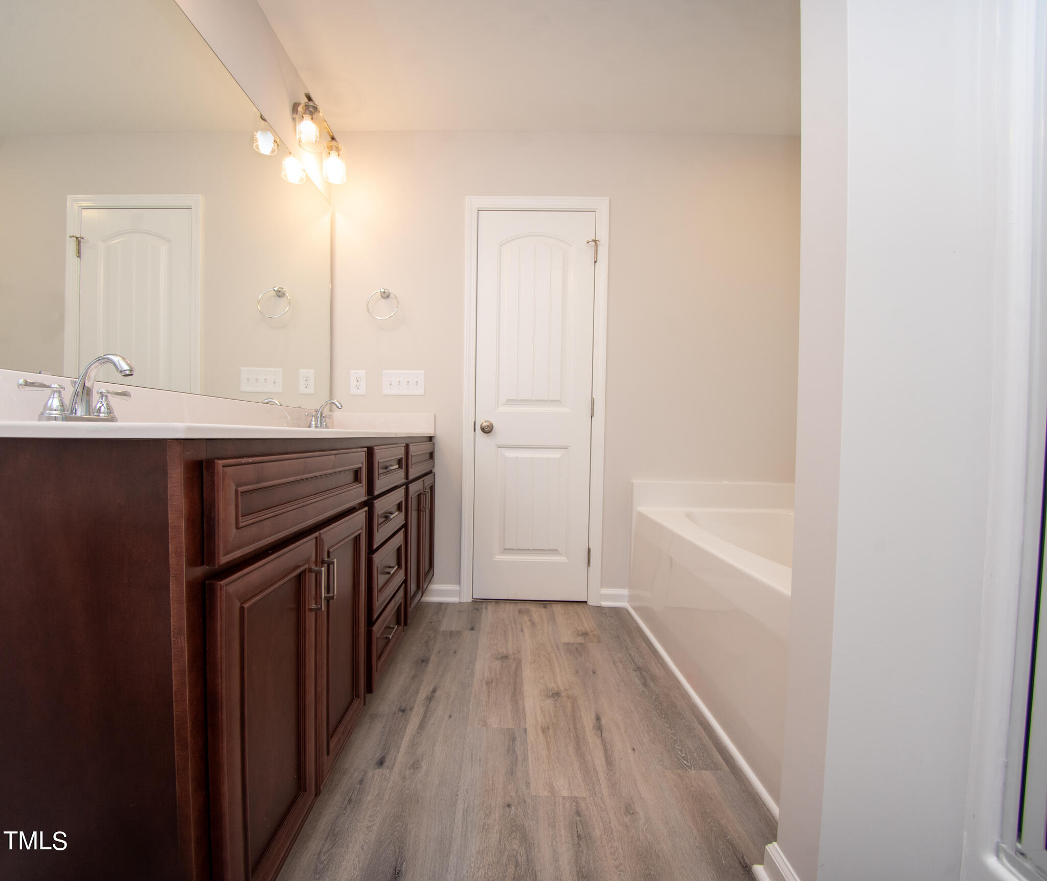 243 Waters Edge Drive Erwin, NC 28339 - Photo 21 of 53 a kitchen with a sink a counter top space and appliances
