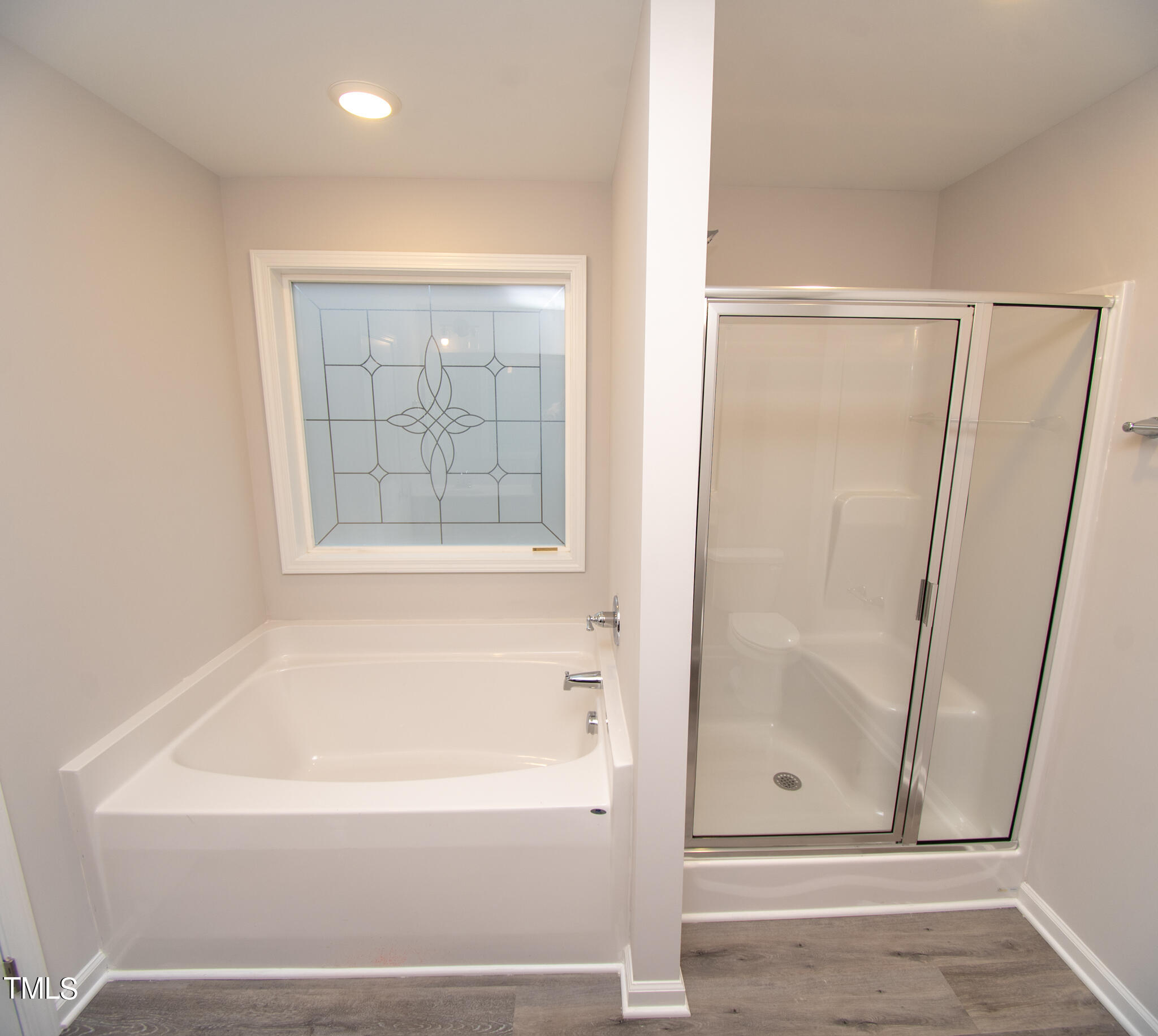 243 Waters Edge Drive Erwin, NC 28339 - Photo 25 of 53 a bathroom with a bathtub