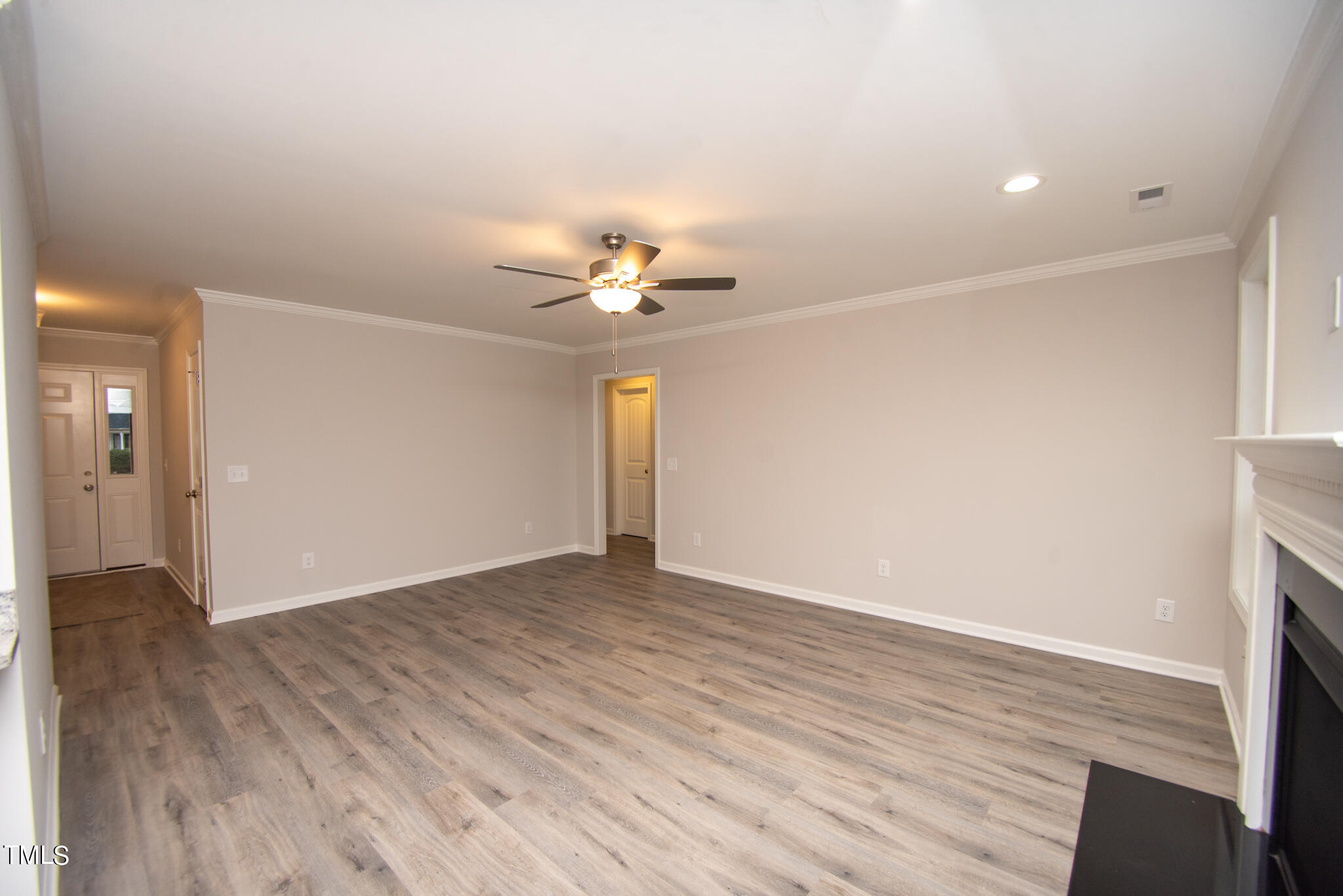243 Waters Edge Drive Erwin, NC 28339 - Photo 29 of 53 wooden floor in an empty room with a window