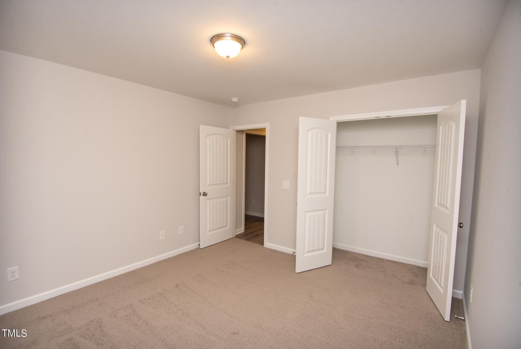 243 Waters Edge Drive Erwin, NC 28339 - Photo 31 of 53 an empty room with closet area