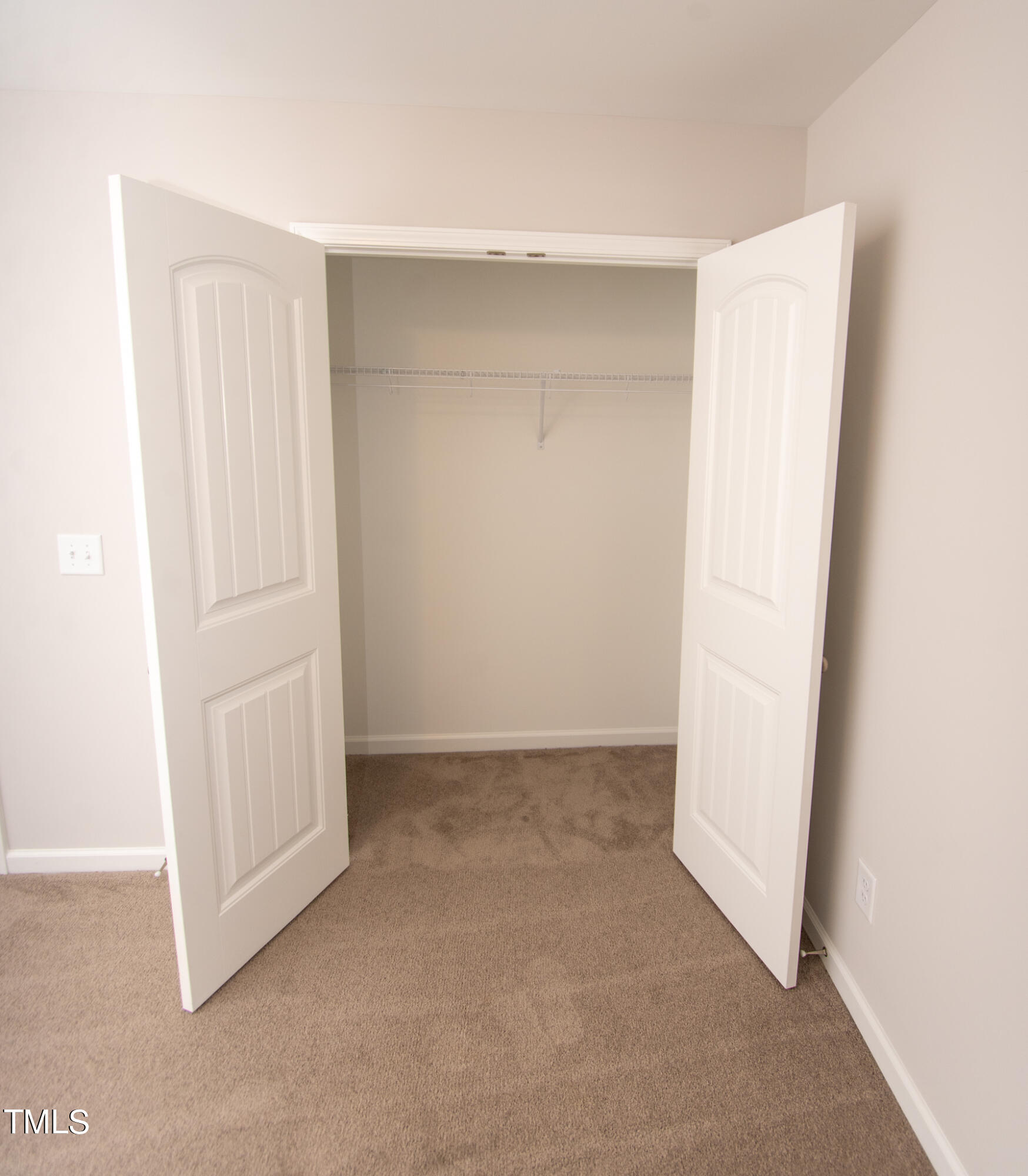243 Waters Edge Drive Erwin, NC 28339 - Photo 32 of 53 an empty room with a wooden floor