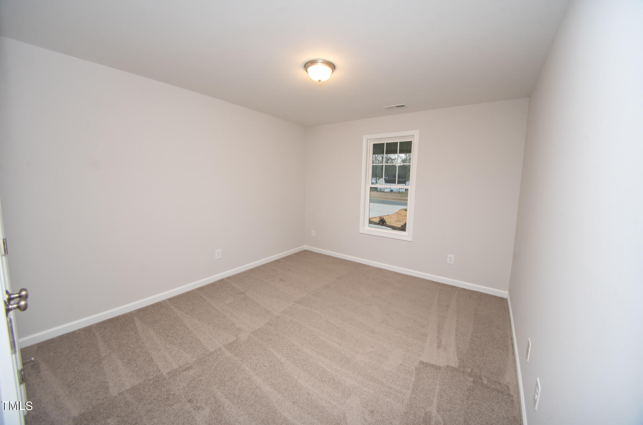 243 Waters Edge Drive Erwin, NC 28339 - Photo 37 of 53 an empty room with windows
