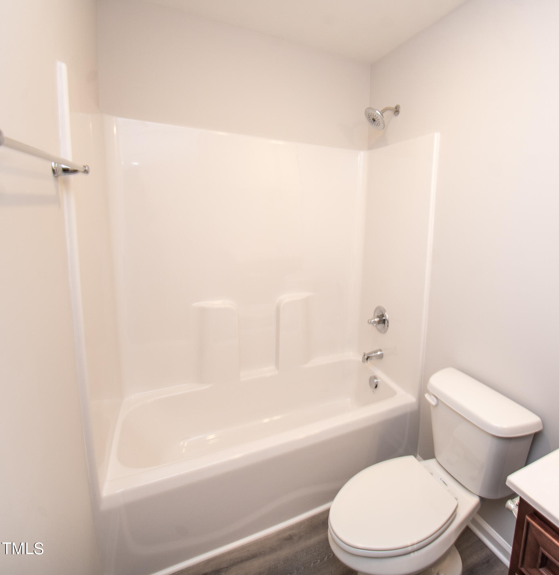 243 Waters Edge Drive Erwin, NC 28339 - Photo 39 of 53 a bathroom with a toilet and a bathtub