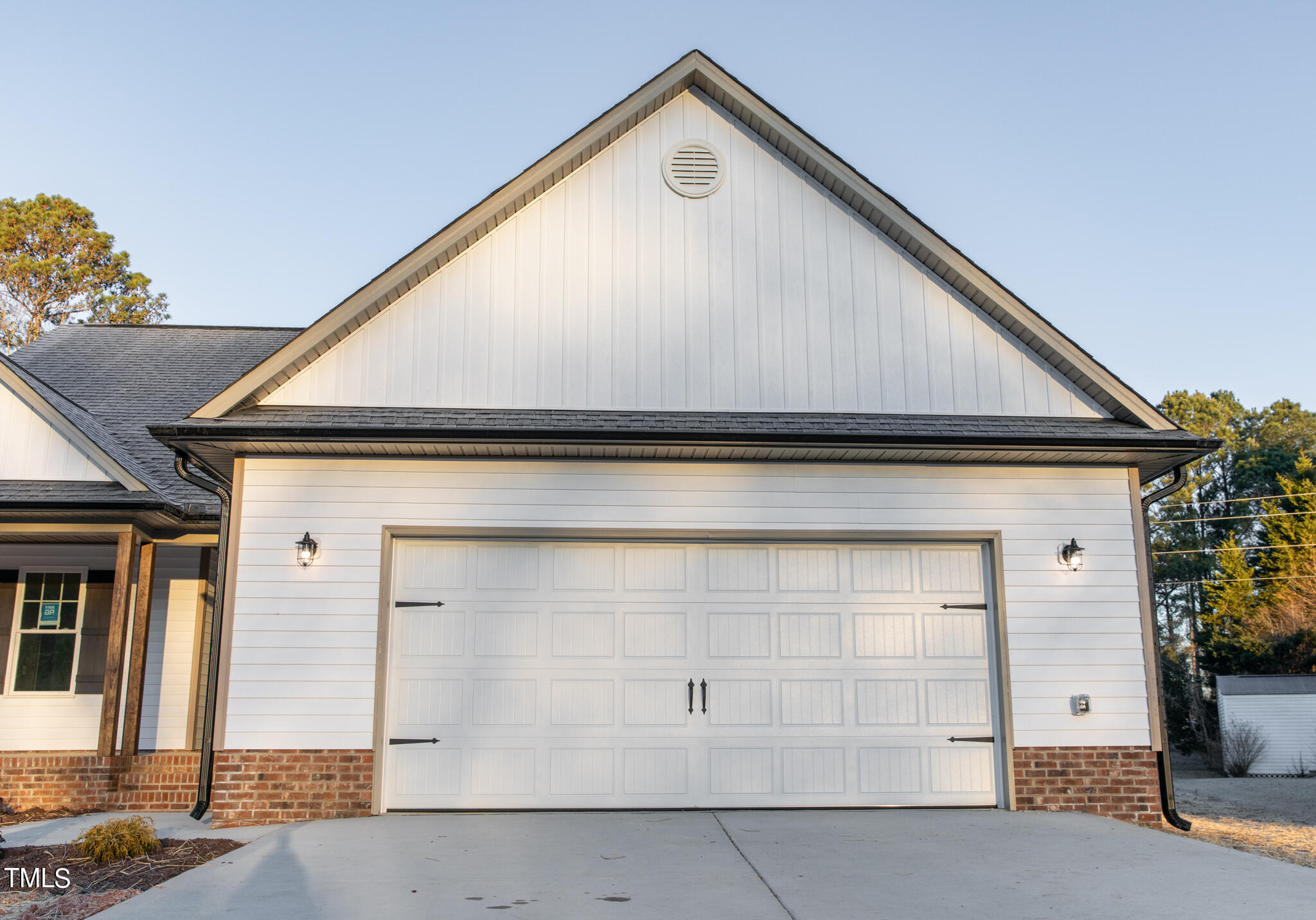 243 Waters Edge Drive Erwin, NC 28339 - Photo 46 of 53 a front view of a house with garage