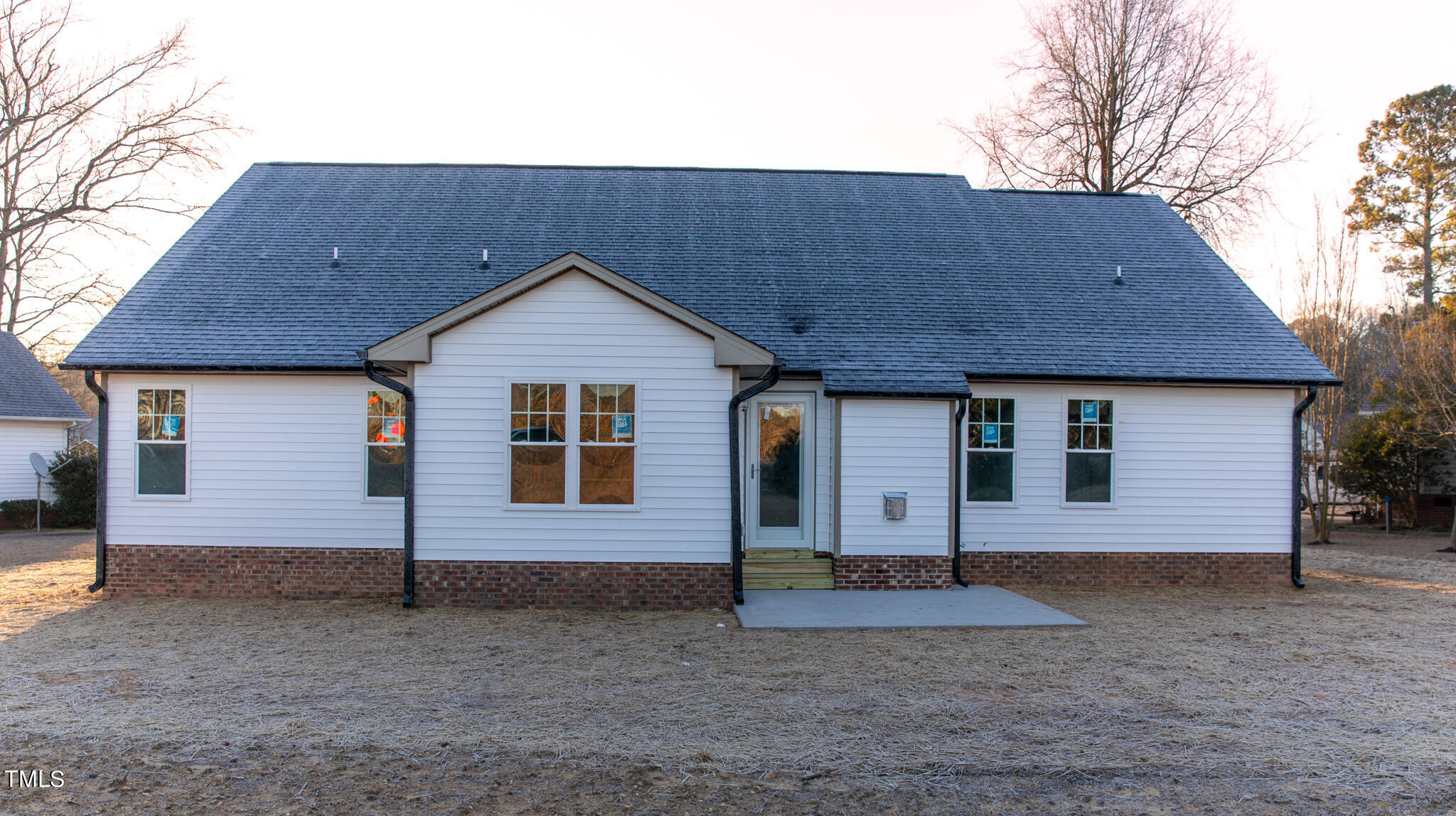 243 Waters Edge Drive Erwin, NC 28339 - Photo 49 of 53 a front view of a house with yard and garage
