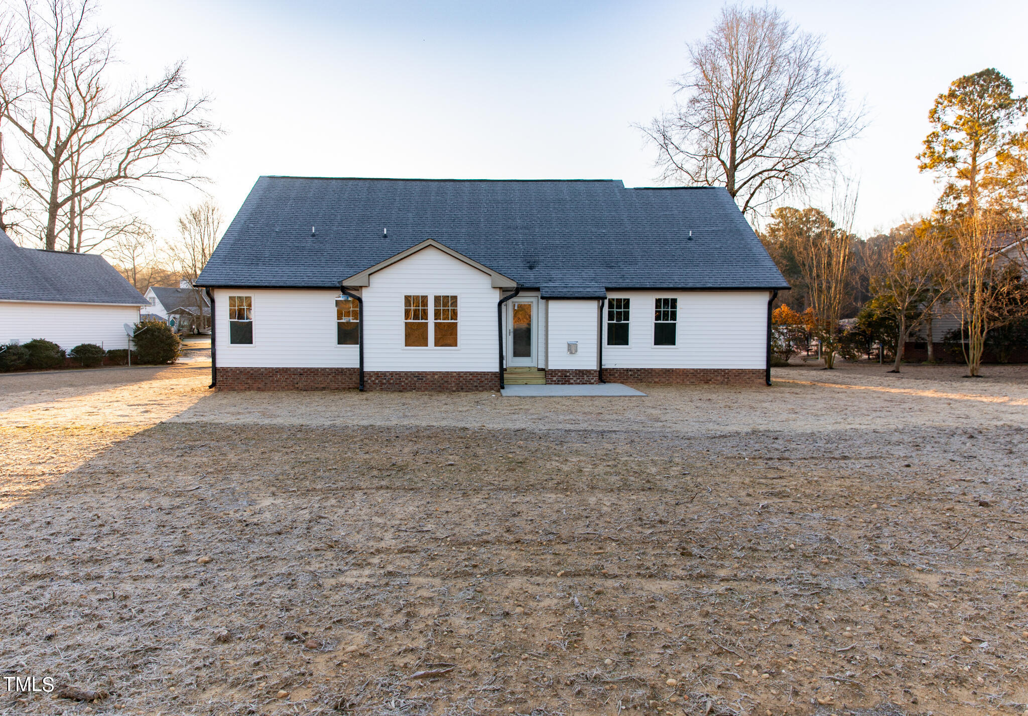243 Waters Edge Drive Erwin, NC 28339 - Photo 50 of 53 a view of a house with a yard covered in snow