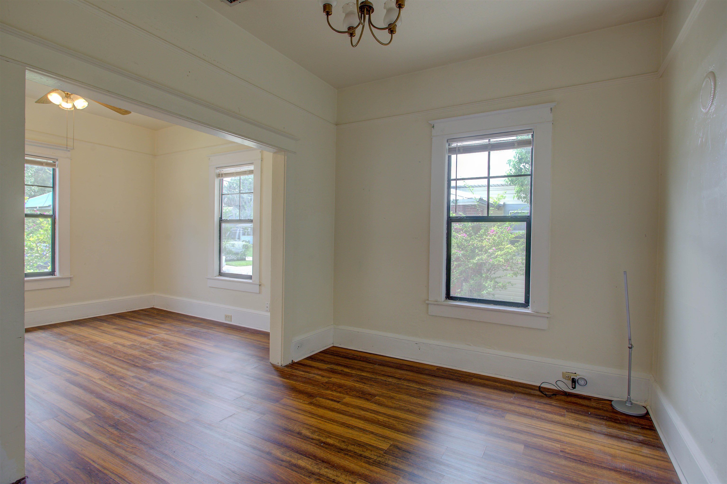 20 Hope Street St. Augustine, FL 32084 - Photo 12 of 35 an empty room with wooden floor and windows