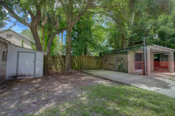 a view of a house with a back yard