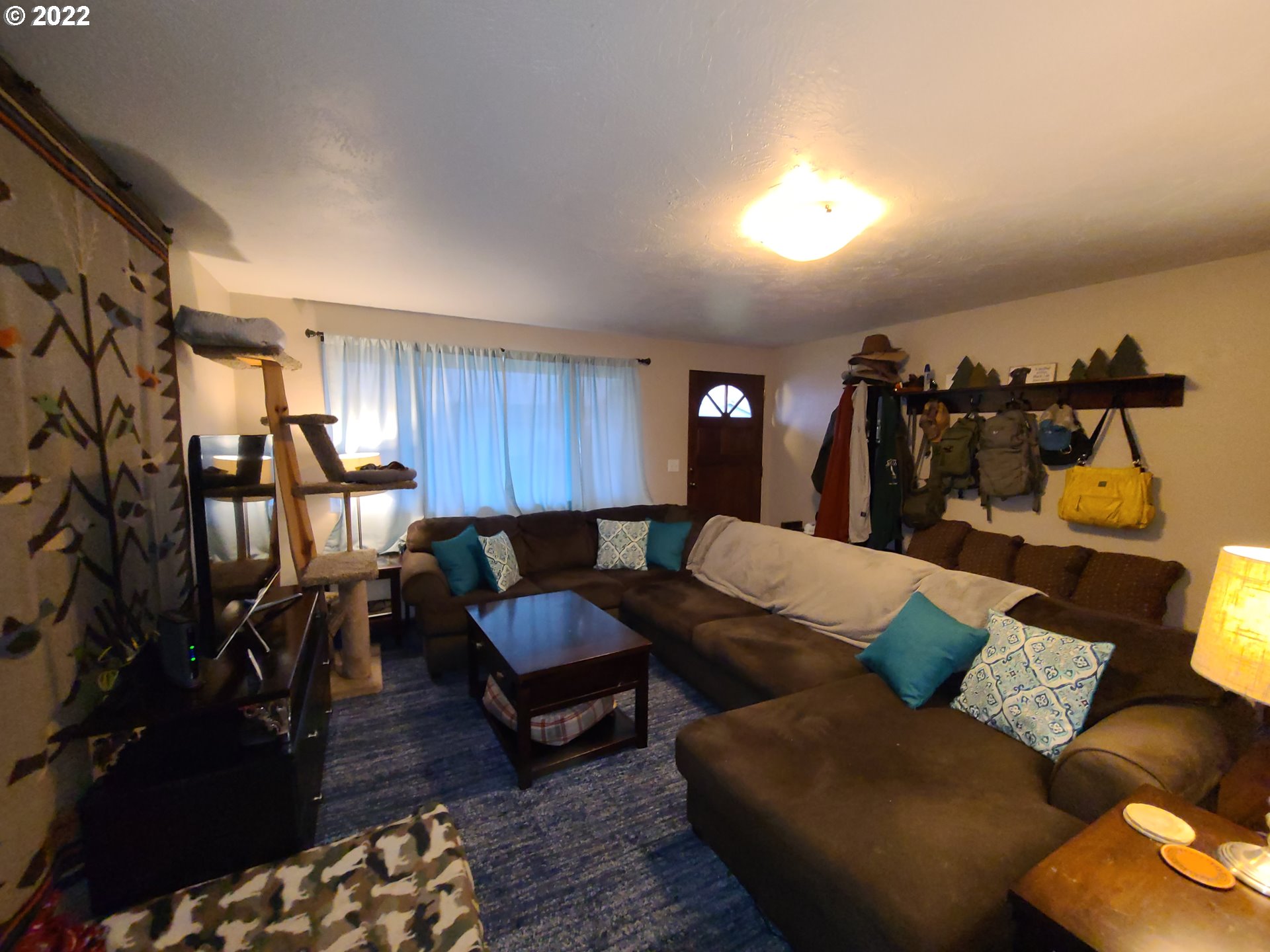410 40th Street Springfield, OR 97478 - Photo 5 of 28 a living room with furniture and a wooden floor