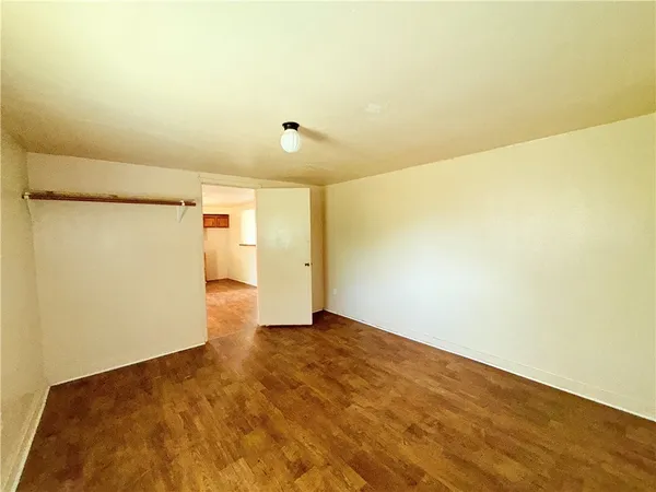a bathroom with a sink mirror toilet and shower