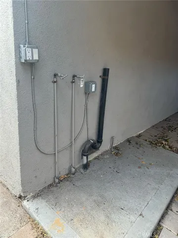a view of a room with wooden walls