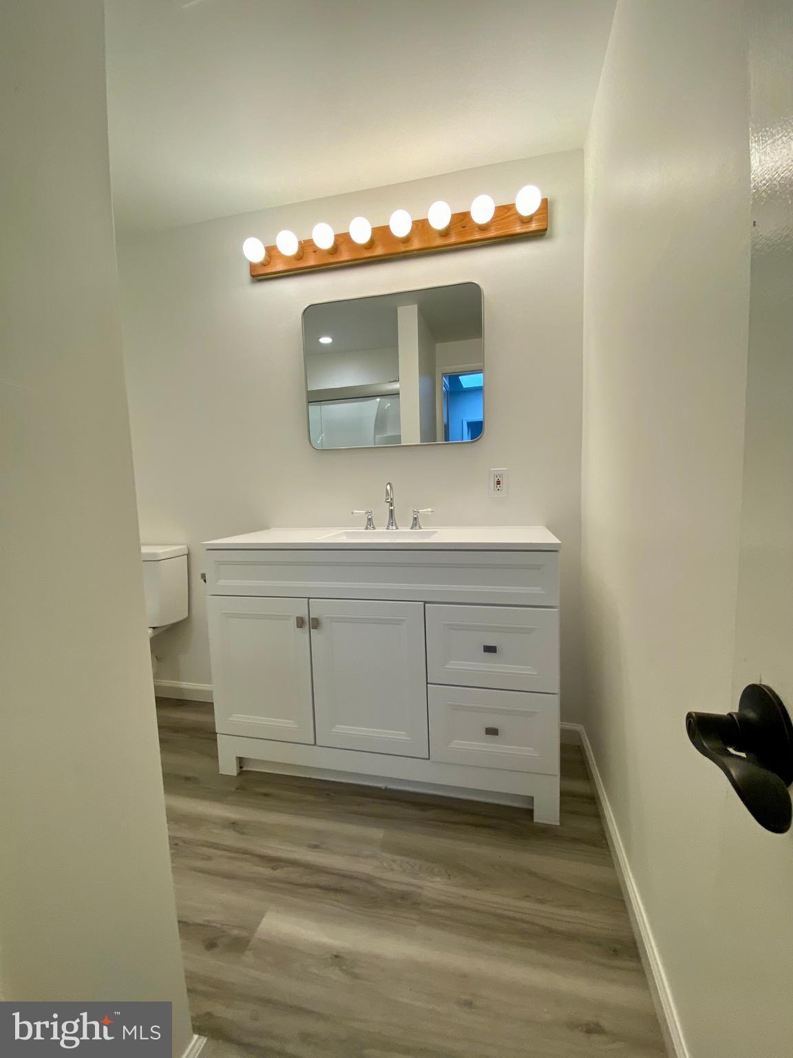 901 South 2nd Street, Unit B Philadelphia, PA 19147 - Photo 6 of 13 a bathroom with a sink and a mirror