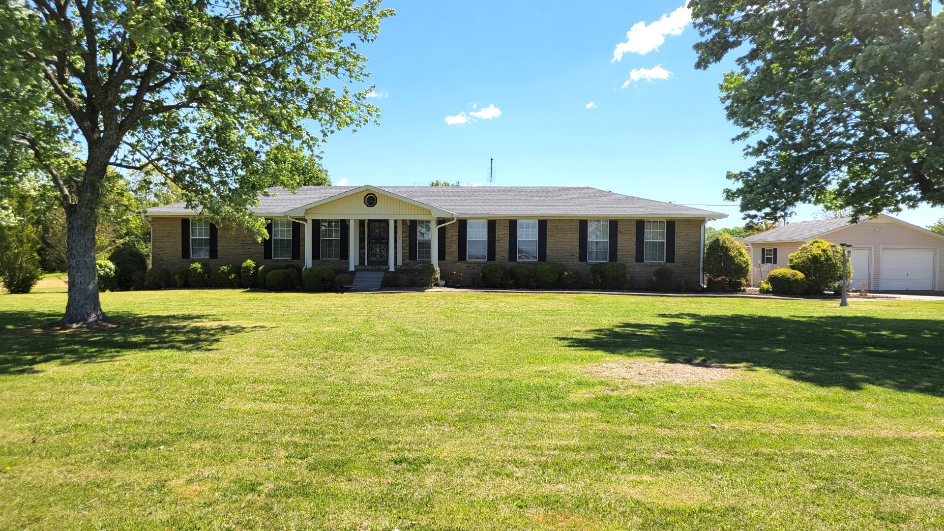1036 Rabbit Trail Road Five Points, TN 38457 - Photo 2 of 53 a view of a house with a yard