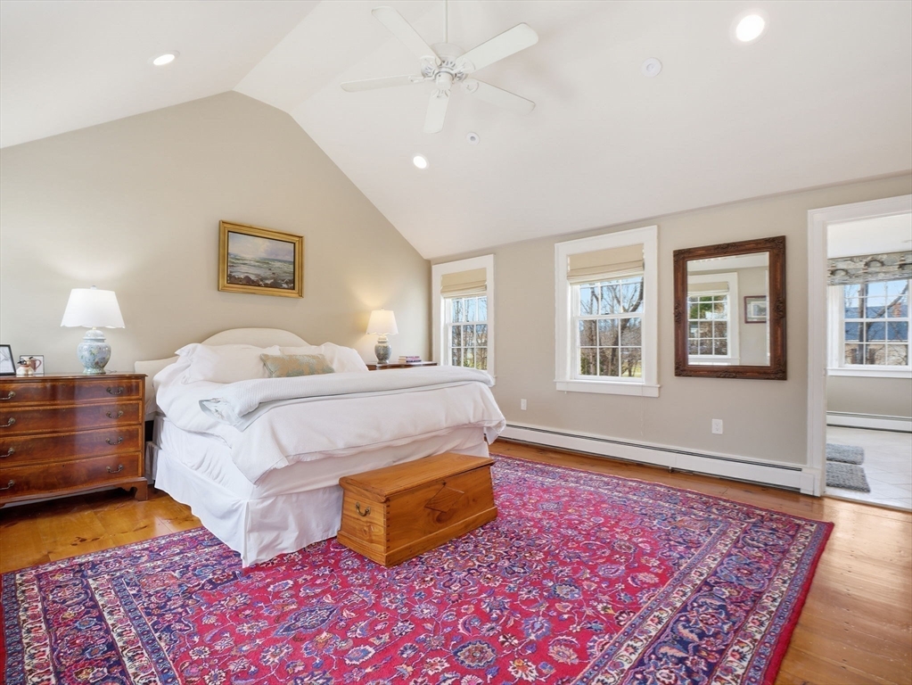 49 Salem Street Andover, MA 01810 - Photo 19 of 39 a bedroom with a bed and a couch