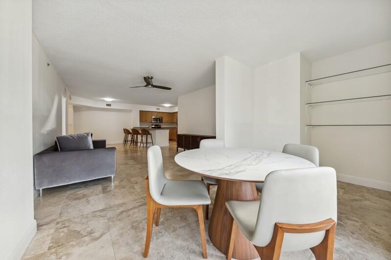 3131 Clint Moore Road, Unit 105 Boca Raton, FL 33496 - Photo 4 of 20 04_3131CLINTMOORERDUNIT105_93_LivingRoom