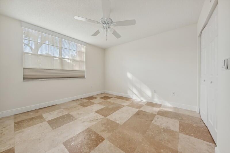 3131 Clint Moore Road, Unit 105 Boca Raton, FL 33496 - Photo 9 of 20 11_3131CLINTMOORERDUNIT105_153_2ndBedroo