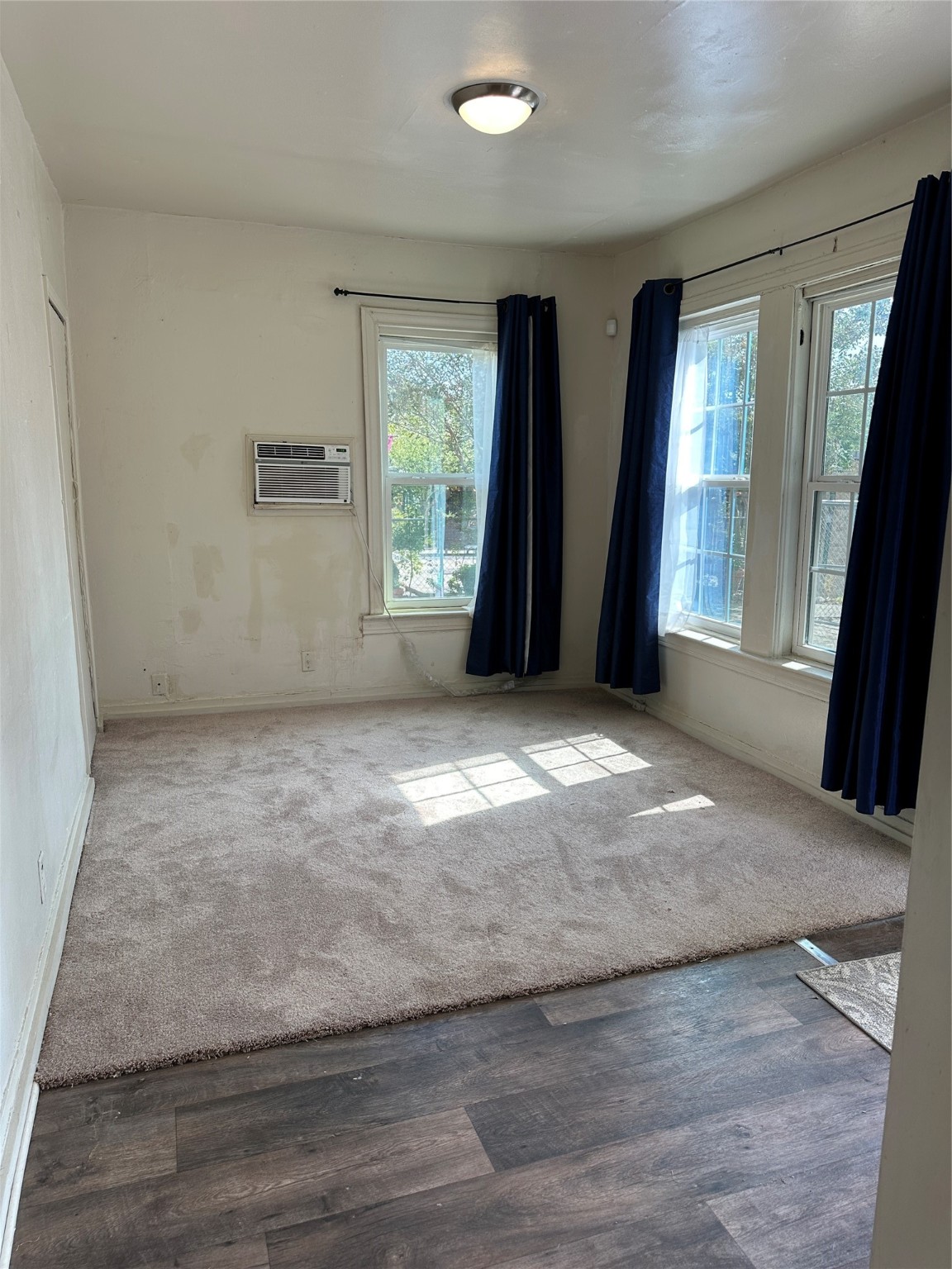 1125 East 27th Street Houston, TX 77009 - Photo 6 of 16 Living Room. Living room has additional closet for storage.