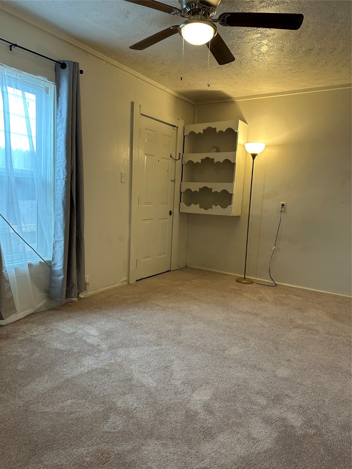 1125 East 27th Street Houston, TX 77009 - Photo 8 of 16 Bedroom 1 with closet and exterior entry.