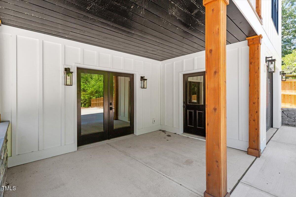 3934 Old Chapel Hill Road Durham, NC 27707 - Photo 44 of 47 a view of an empty room with a sliding door