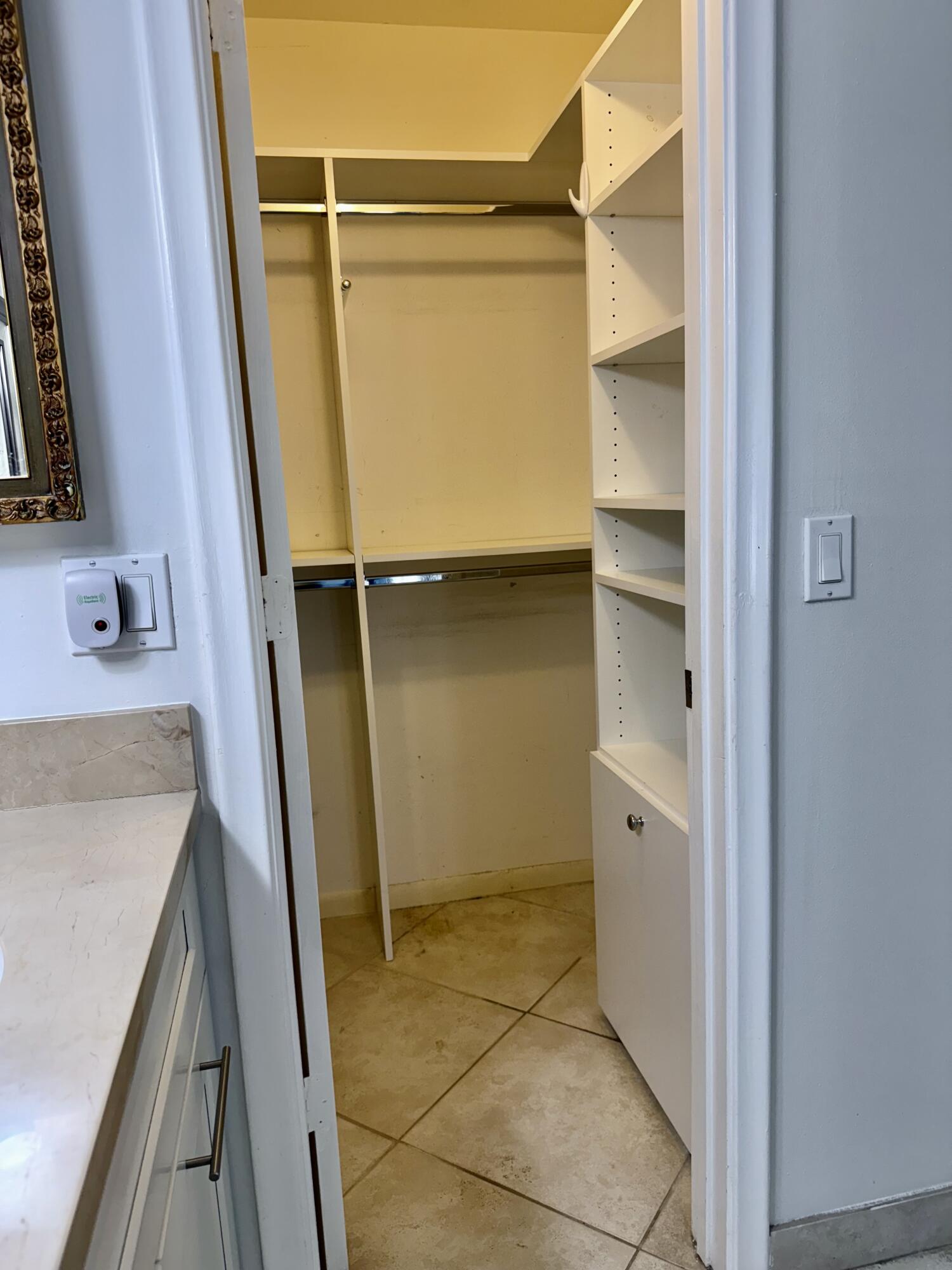 1720 Northwest 20th Avenue, Unit 204 Delray Beach, FL 33445 - Photo 19 of 30 a bathroom with a tub and sink