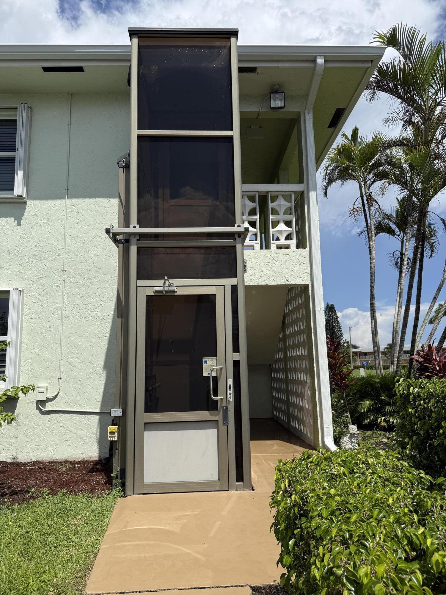 1720 Northwest 20th Avenue, Unit 204 Delray Beach, FL 33445 - Photo 4 of 30 a view of entryway