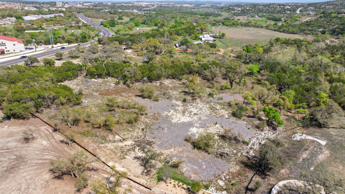 0 Spring Preserve Trail Austin, TX 78738 - Photo 3 of 7 a view of a forest with a lake