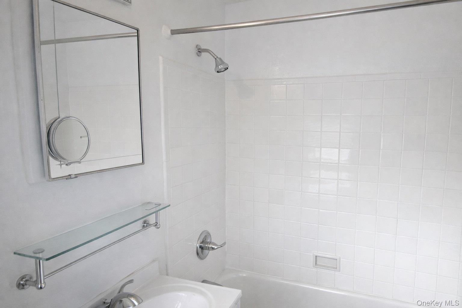 192 Garth Road, Unit 4N Scarsdale, NY 10583 - Photo 23 of 32 a bathroom with a toilet and a shower
