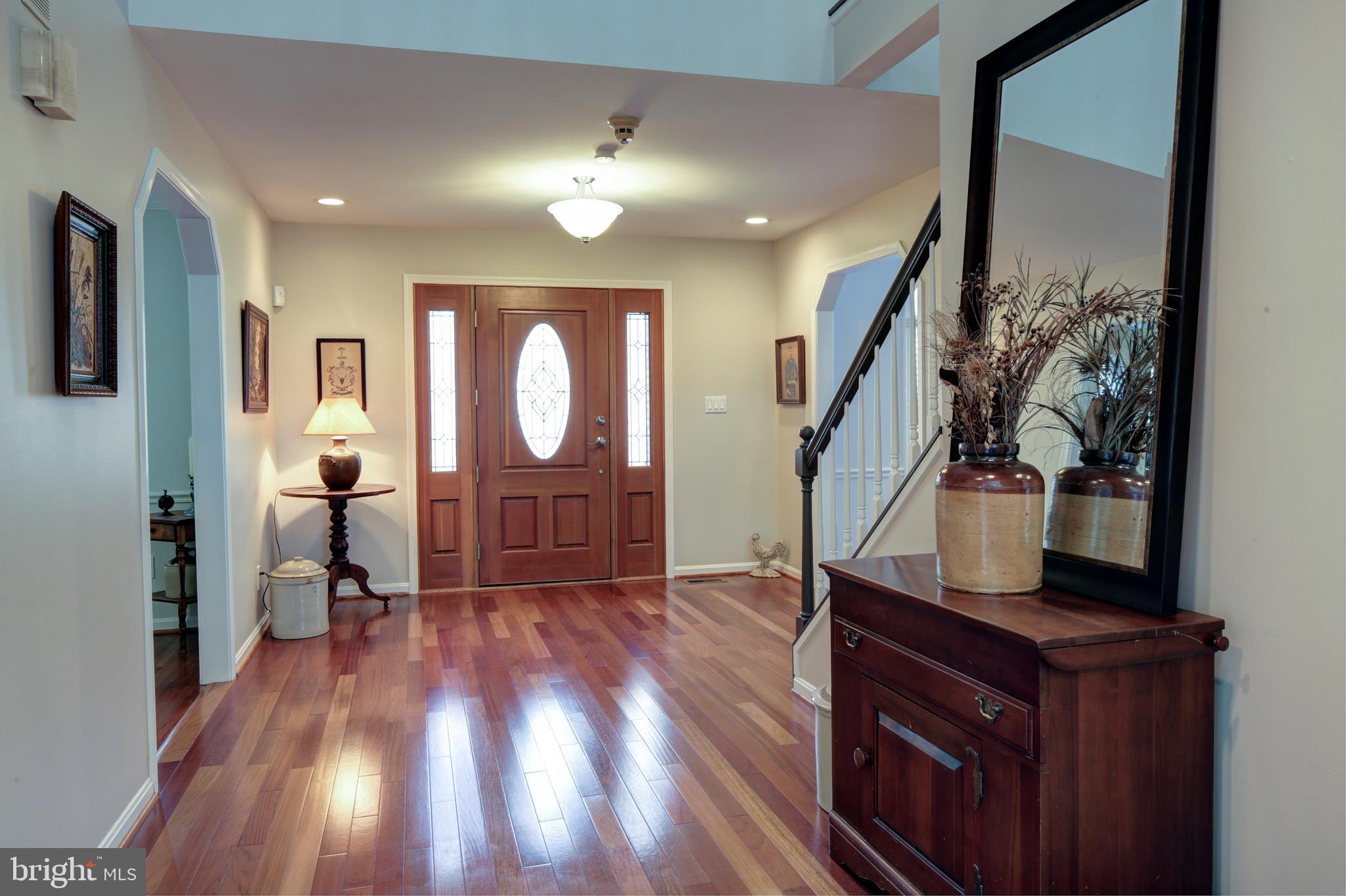 735 Carson Road Huntingtown, MD 20639 - Photo 5 of 37 a view of entryway and hall with wooden floor